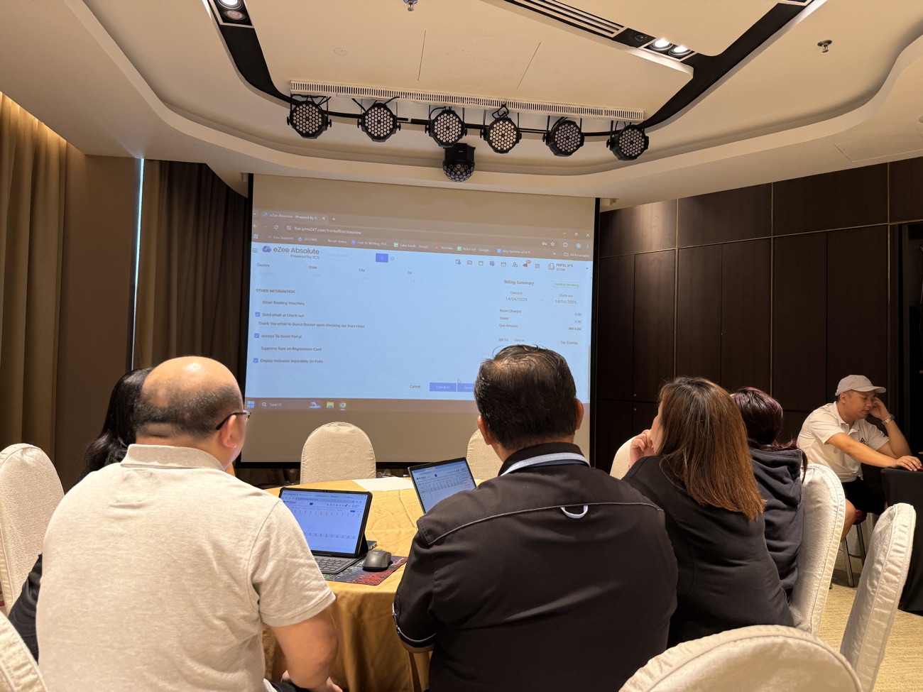 Ang Systems hands-on PMS training session with hoteliers